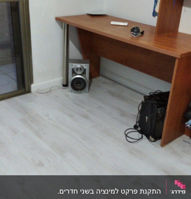 התקנת פרקט למינציה בשני חדרים.